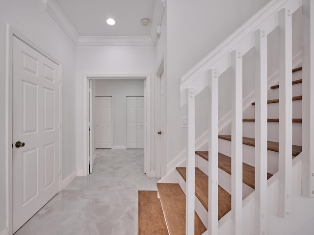 10889 Fillmore Dr, Boynton Beach, FL 33437 - stairway featuring ornamental molding, marble look tile flooring, and recessed lighting