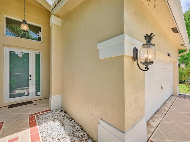 10889 Fillmore Dr, Boynton Beach, FL 33437 - entrance to property featuring stucco siding and a garage