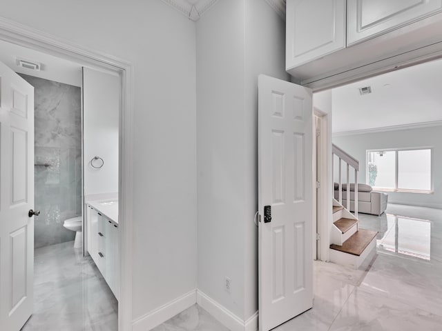 10889 Fillmore Dr, Boynton Beach, FL 33437 - bathroom featuring marble finish flooring, vanity, and crown molding