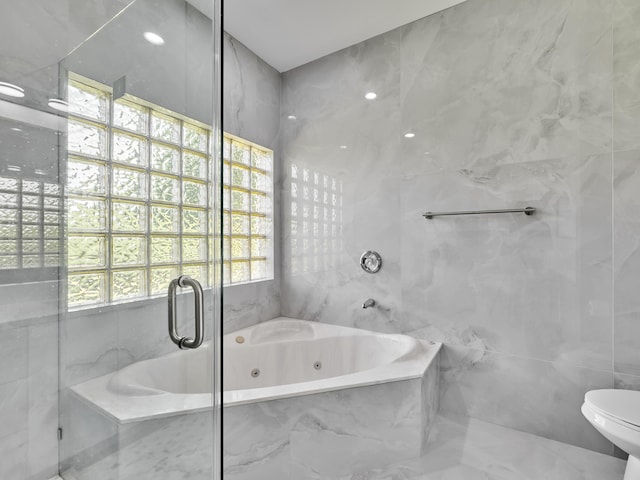 10889 Fillmore Dr, Boynton Beach, FL 33437 - bathroom featuring tile walls, a tub with jets, and a marble finish shower