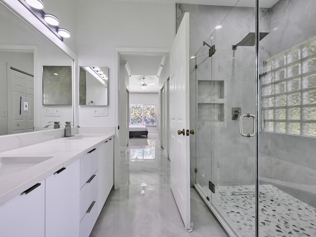 10889 Fillmore Dr, Boynton Beach, FL 33437 - bathroom with a stall shower, double vanity, and a ceiling fan