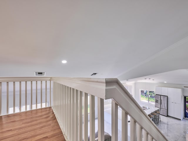 10889 Fillmore Dr, Boynton Beach, FL 33437 - corridor with ornamental molding, recessed lighting, and light wood-style flooring