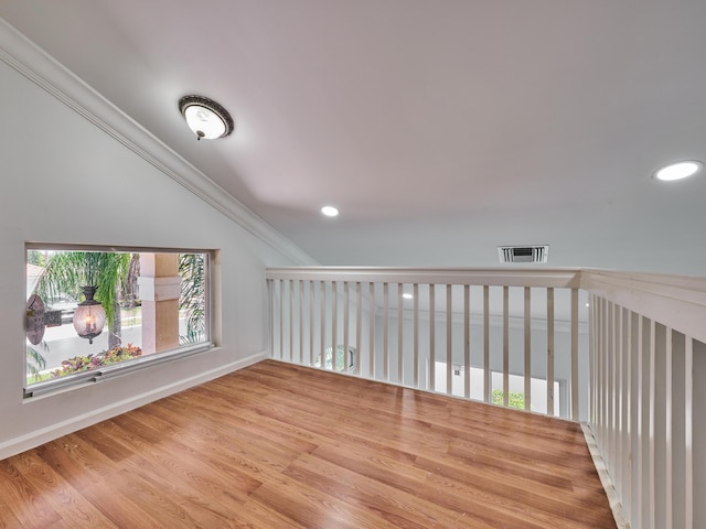 10889 Fillmore Dr, Boynton Beach, FL 33437 - additional living space with wood finished floors, recessed lighting, and vaulted ceiling