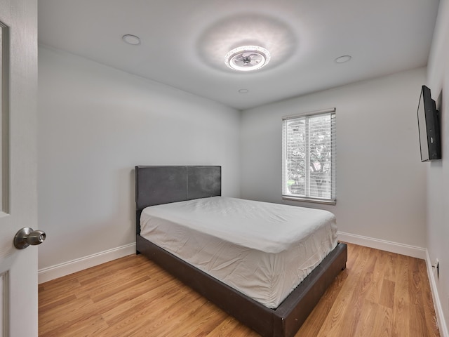 10889 Fillmore Dr, Boynton Beach, FL 33437 - bedroom with baseboards and light wood finished floors