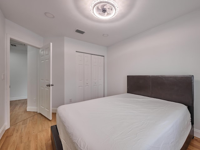 10889 Fillmore Dr, Boynton Beach, FL 33437 - bedroom featuring light wood-type flooring and a closet