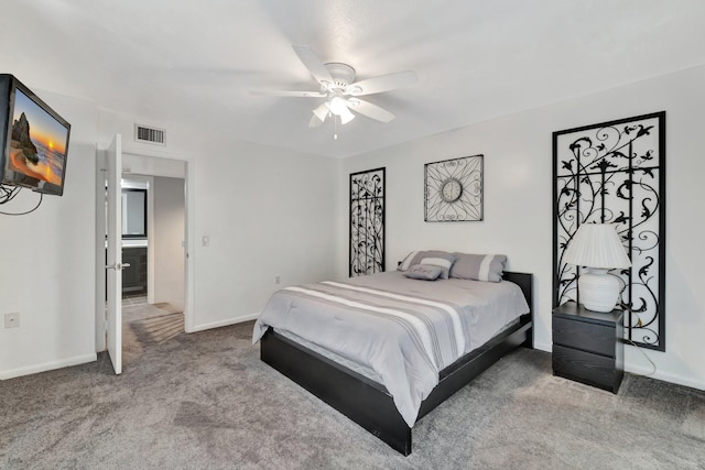 3675 SW Sunset Trace Cir, Palm City, FL 34990 - carpeted bedroom with baseboards and ceiling fan