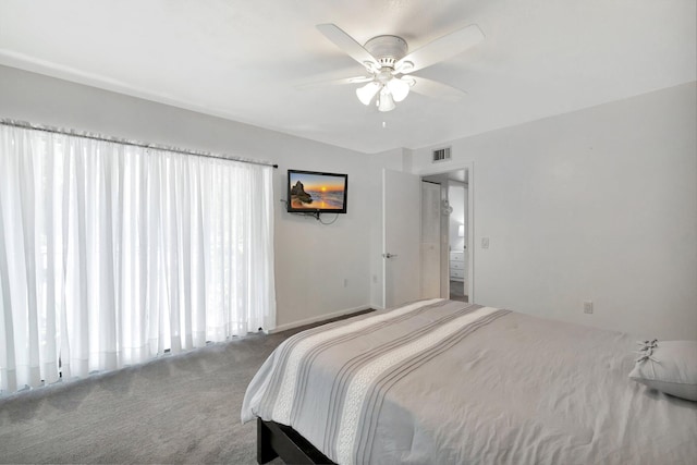 3675 SW Sunset Trace Cir, Palm City, FL 34990 - bedroom with carpet flooring and a ceiling fan