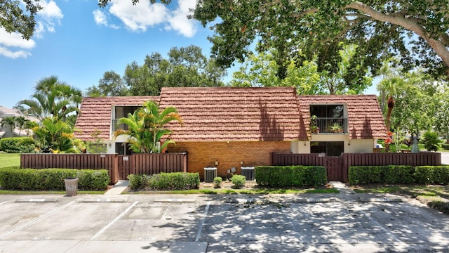 3675 SW Sunset Trace Cir, Palm City, FL 34990 - community / neighborhood sign featuring uncovered parking and a gate