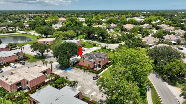 3675 SW Sunset Trace Cir, Palm City, FL 34990 - aerial perspective of suburban area with a large body of water