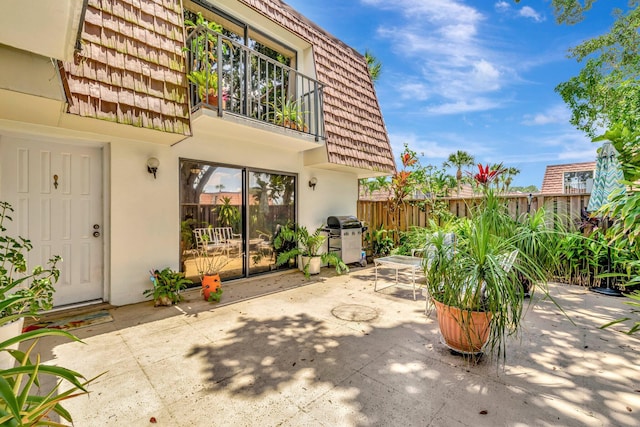 3675 SW Sunset Trace Cir, Palm City, FL 34990 - fenced backyard with a grill and a patio
