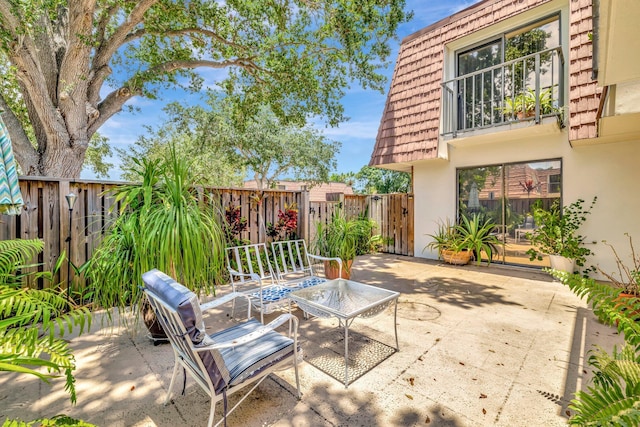 3675 SW Sunset Trace Cir, Palm City, FL 34990 - fenced backyard featuring a patio and a gate