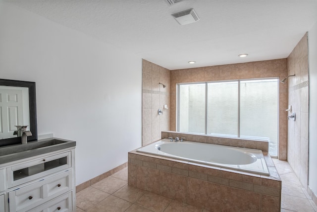 15213 N 93rd St, The Acreage, FL 33412 - full bath with tiled tub, vanity, tile patterned flooring, and tiled shower