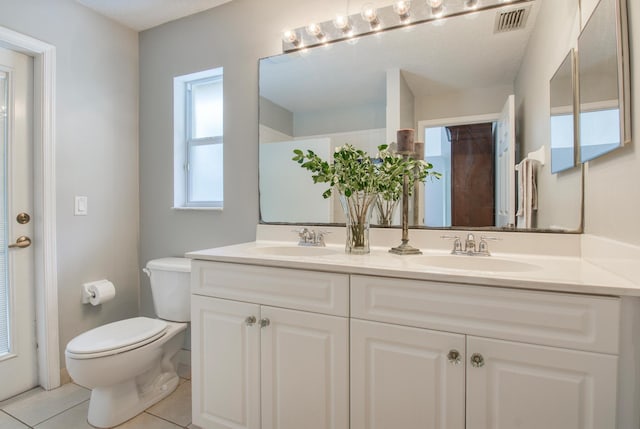 15213 N 93rd St, The Acreage, FL 33412 - bathroom featuring double vanity and tile patterned flooring