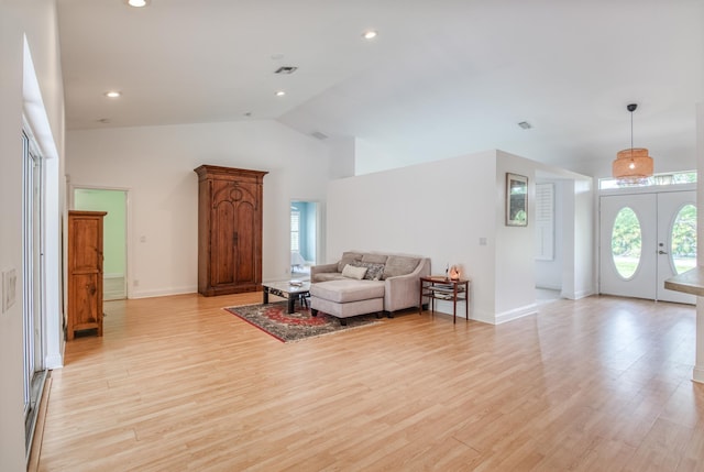 15213 N 93rd St, The Acreage, FL 33412 - living area with high vaulted ceiling, light wood-style flooring, and recessed lighting