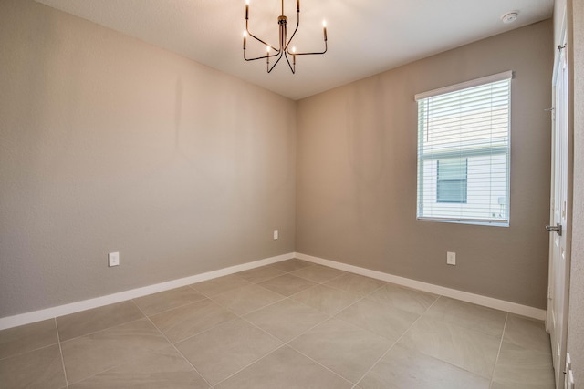 1878 NE Ocean Dunes Dr, Jensen Beach, FL 34957 - spare room featuring a chandelier, a smoke detector, and light tile patterned flooring