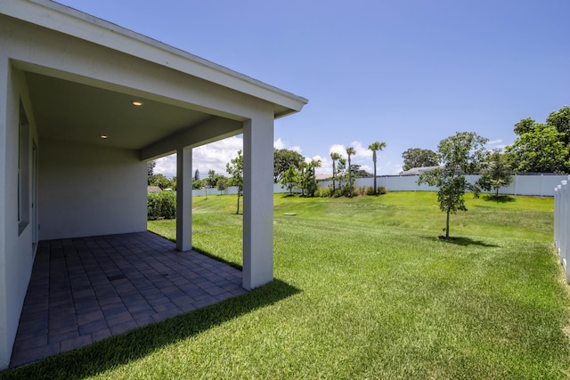 1878 NE Ocean Dunes Dr, Jensen Beach, FL 34957 - view of yard with a patio area