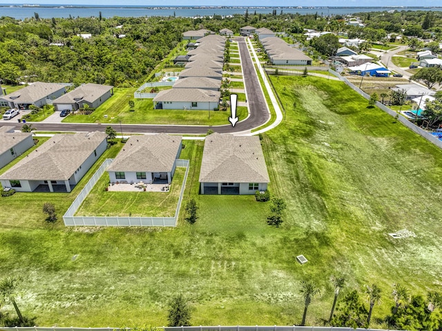1878 NE Ocean Dunes Dr, Jensen Beach, FL 34957 - aerial perspective of suburban area featuring a large body of water