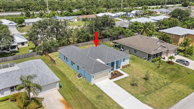 3257 SE Snow Rd, Port Saint Lucie, FL 34984 - aerial perspective of suburban area