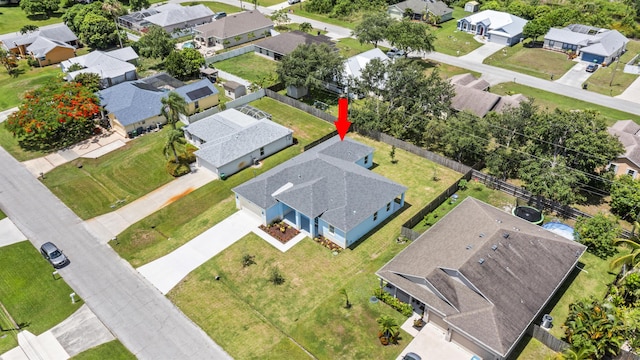 3257 SE Snow Rd, Port Saint Lucie, FL 34984 - aerial perspective of suburban area