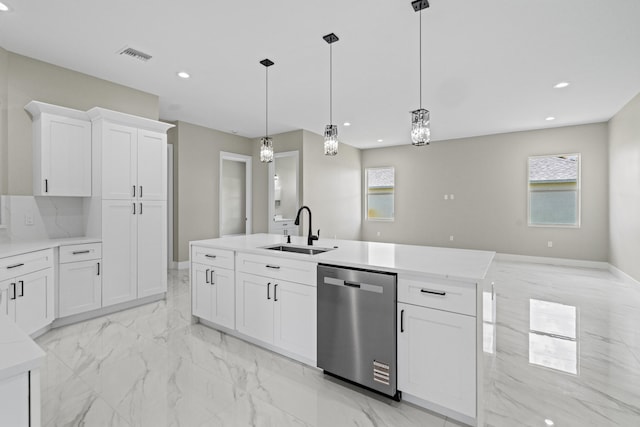 3257 SE Snow Rd, Port Saint Lucie, FL 34984 - kitchen with dishwasher, light marble finish flooring, a center island with sink, white cabinets, and recessed lighting