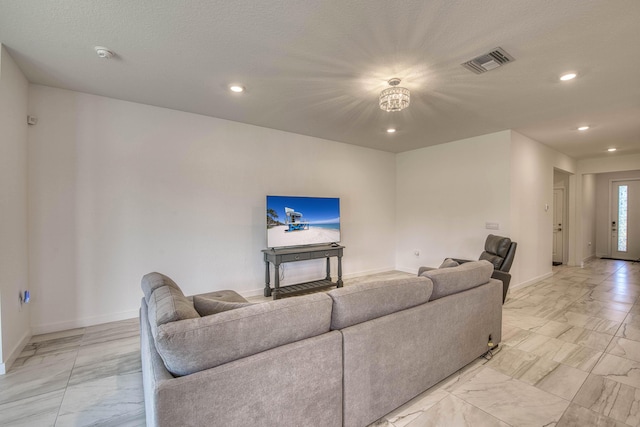 1850 NE Ocean Dunes Dr, Jensen Beach, FL 34957 - living area with light marble finish flooring and recessed lighting