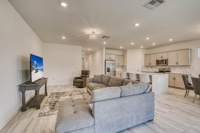 1850 NE Ocean Dunes Dr, Jensen Beach, FL 34957 - living area featuring recessed lighting and baseboards