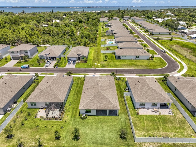 1850 NE Ocean Dunes Dr, Jensen Beach, FL 34957 - aerial view of residential area featuring a large body of water