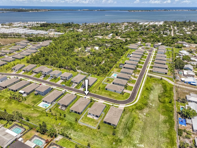 1850 NE Ocean Dunes Dr, Jensen Beach, FL 34957 - aerial overview of property's location with nearby suburban area and a large body of water