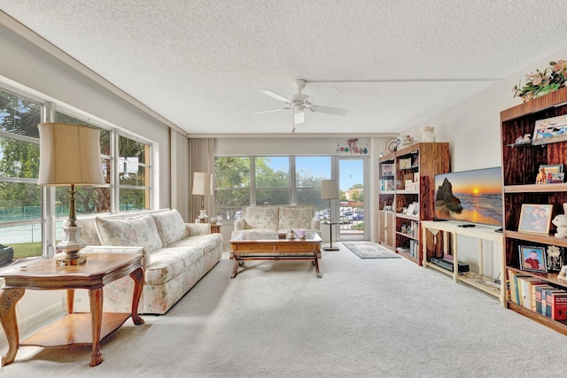 10777 W Sample Rd Unit 207, Coral Springs, FL 33065 - carpeted living room with a ceiling fan and a textured ceiling
