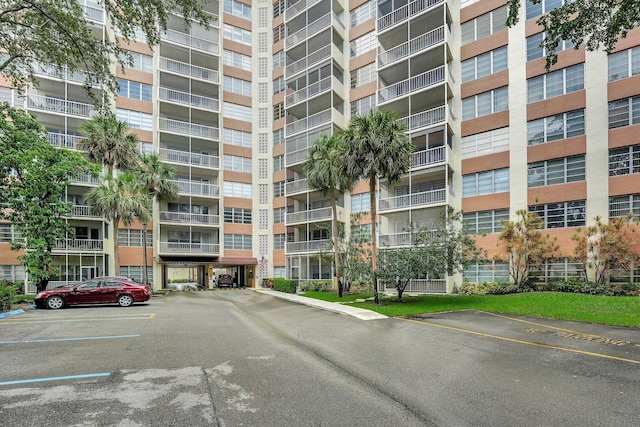 10777 W Sample Rd Unit 207, Coral Springs, FL 33065 - view of apartment building / complex with uncovered parking