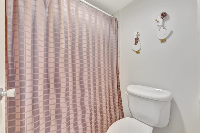 10777 W Sample Rd Unit 207, Coral Springs, FL 33065 - full bathroom featuring toilet and curtained shower