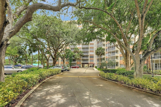 10777 W Sample Rd Unit 207, Coral Springs, FL 33065 - view of community featuring uncovered parking