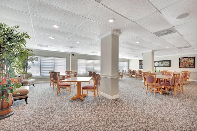 10777 W Sample Rd Unit 207, Coral Springs, FL 33065 - carpeted dining area with decorative columns, a paneled ceiling, and recessed lighting