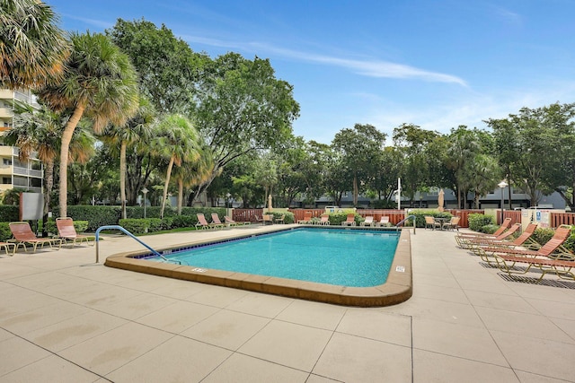 10777 W Sample Rd Unit 207, Coral Springs, FL 33065 - community pool featuring a patio