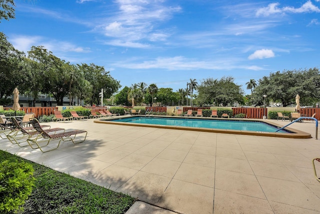 10777 W Sample Rd Unit 207, Coral Springs, FL 33065 - community pool featuring a patio