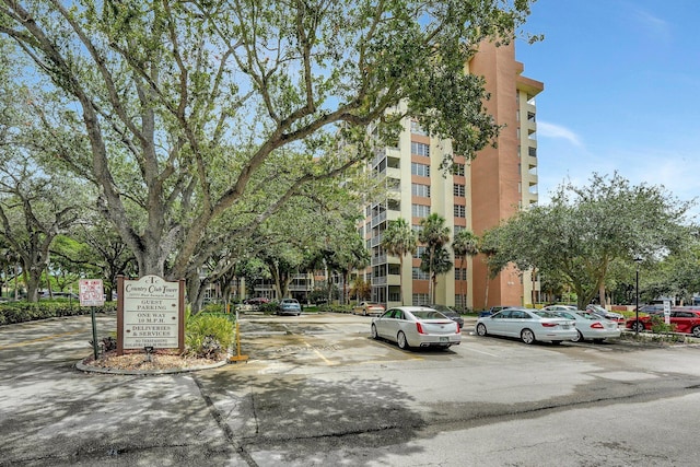 10777 W Sample Rd Unit 207, Coral Springs, FL 33065 - view of apartment building / complex with uncovered parking