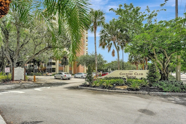 10777 W Sample Rd Unit 207, Coral Springs, FL 33065 - community / neighborhood sign with uncovered parking