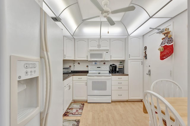 10777 W Sample Rd Unit 207, Coral Springs, FL 33065 - kitchen with white appliances, white cabinetry, and ceiling fan
