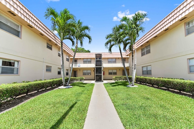 444 Saxony J, Delray Beach, FL 33446 - view of property's community with a lawn