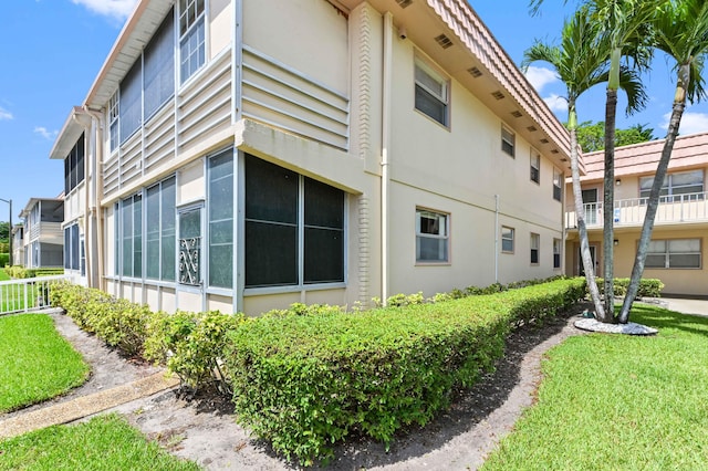 444 Saxony J, Delray Beach, FL 33446 - view of property exterior with stucco siding