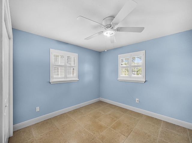 1303 NW 2nd St, Delray Beach, FL 33444 - unfurnished room with a ceiling fan and tile patterned flooring