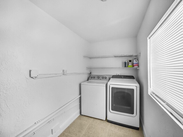 1303 NW 2nd St, Delray Beach, FL 33444 - washroom featuring washer and clothes dryer