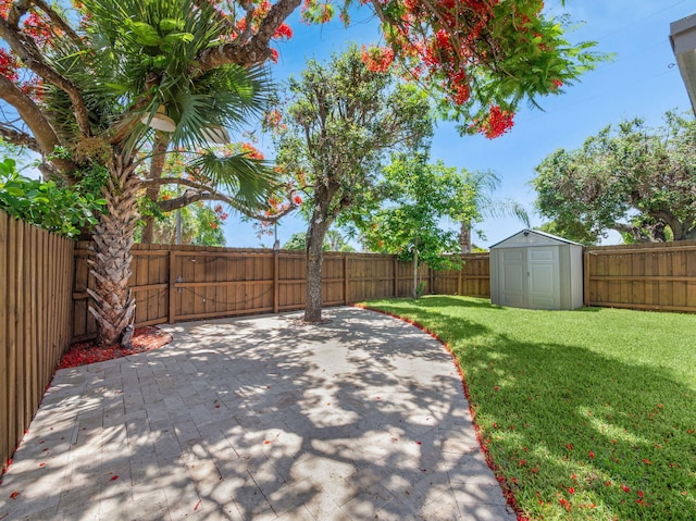 1303 NW 2nd St, Delray Beach, FL 33444 - fenced backyard featuring a patio area and a shed