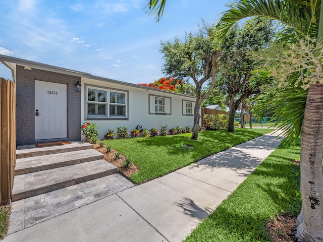 1303 NW 2nd St, Delray Beach, FL 33444 - single story home with brick siding and stucco siding