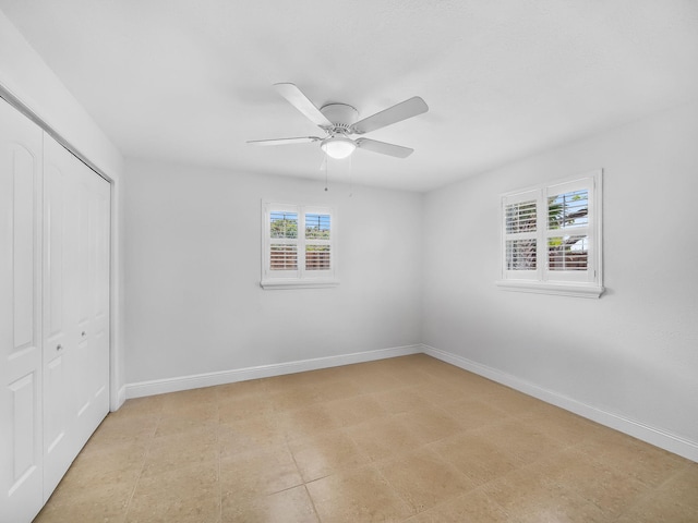 1303 NW 2nd St, Delray Beach, FL 33444 - unfurnished bedroom featuring a closet and ceiling fan