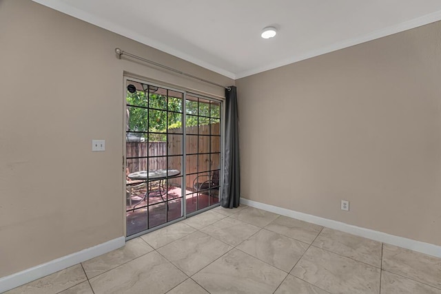 732 Neil Rd Unit 1-4, West Palm Beach, FL 33415 - spare room with baseboards and ornamental molding