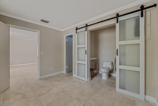 732 Neil Rd Unit 1-4, West Palm Beach, FL 33415 - unfurnished bedroom featuring a barn door, crown molding, and connected bathroom