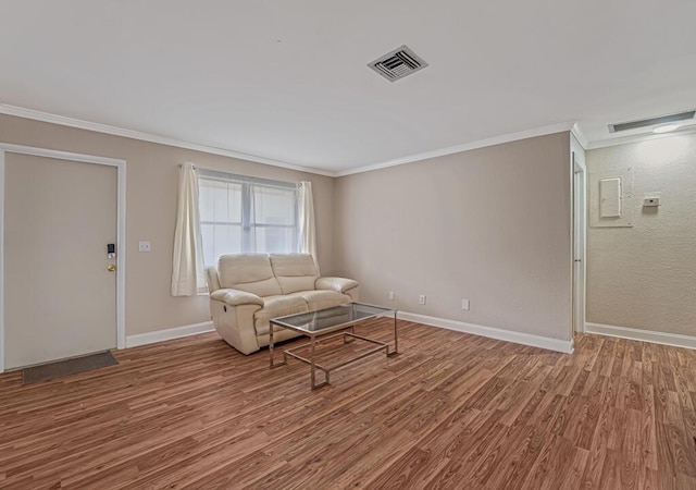 732 Neil Rd Unit 1-4, West Palm Beach, FL 33415 - living area with wood finished floors and crown molding