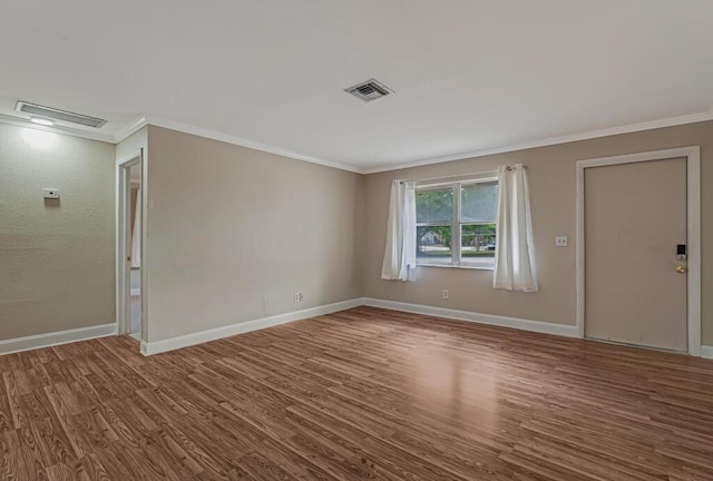 732 Neil Rd Unit 1-4, West Palm Beach, FL 33415 - empty room with ornamental molding and wood finished floors