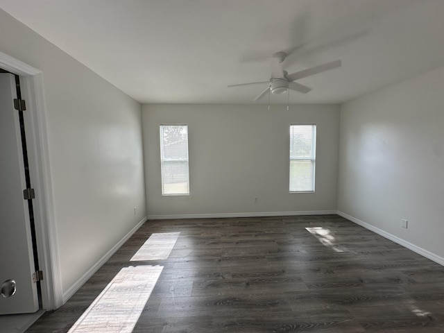 226 SW Statler Ave, Port Saint Lucie, FL 34984 - spare room with healthy amount of natural light, ceiling fan, and dark wood-style floors
